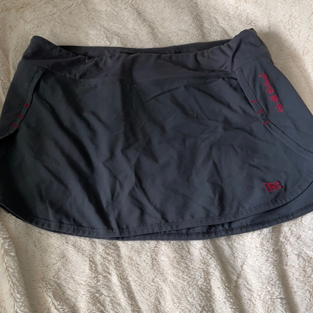 NWOT women’s black dog skirt! Size medium